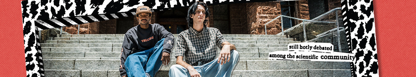 Two young men in casual clothes sit on stone steps in front of a building, surrounded by a bold, black-and-white patterned border with cut-out text that reads, still baby debated among the scientific community.