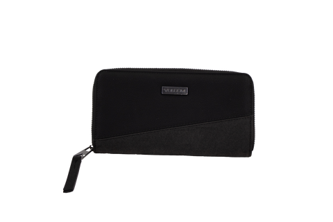 A black zippered Volcom Women's Palmcation wallet, checkbook-sized and adorned with a small rectangular metal logo plate on the front, is displayed against a plain white background—an ideal everyday companion for sleek organization.