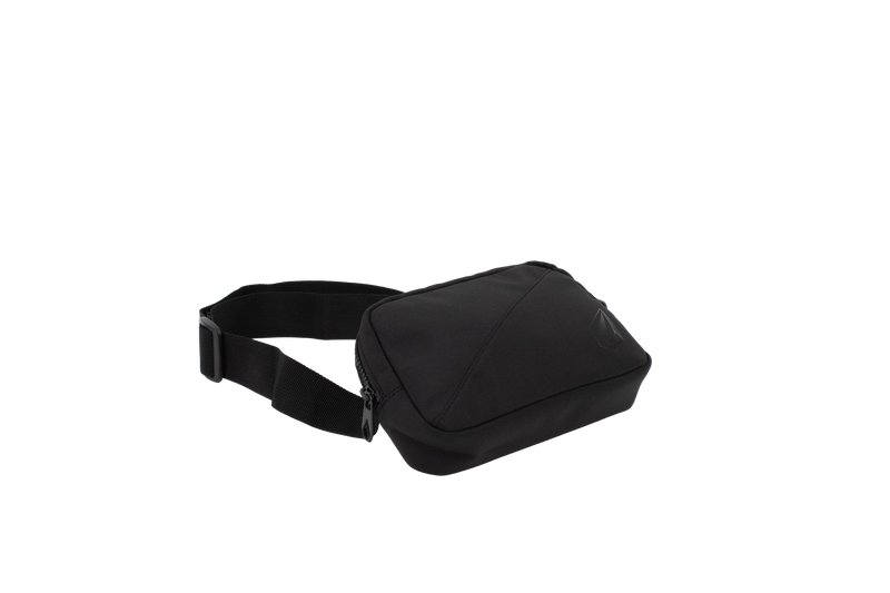 Introducing the Volcom Women's Carryall—a compact black waist bag ideal for carrying your everyday essentials. This sleek accessory features a zippered main compartment and an adjustable strap for the perfect fit, shown here against a plain white background. Perfect as a hands-free travel companion, it’s designed to keep you organized on the go.