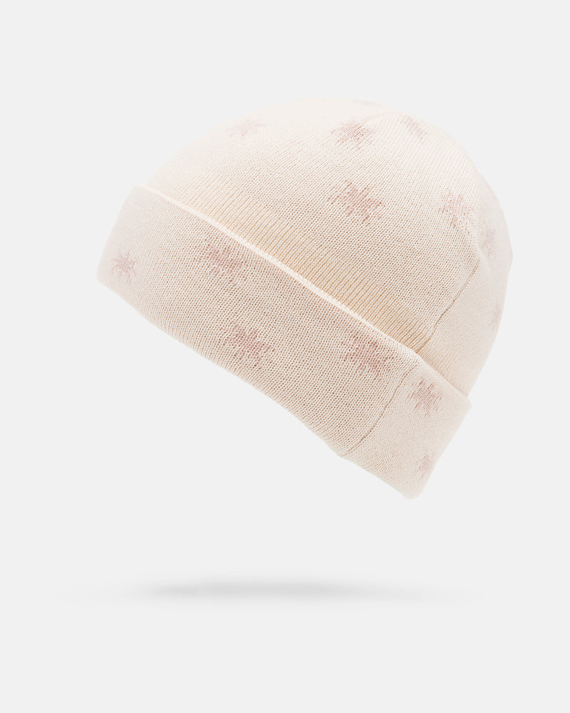 The Women’s Printy Rad Beanie by Volcom is a light beige acrylic knit with a folded brim and subtle embroidered starburst accents.