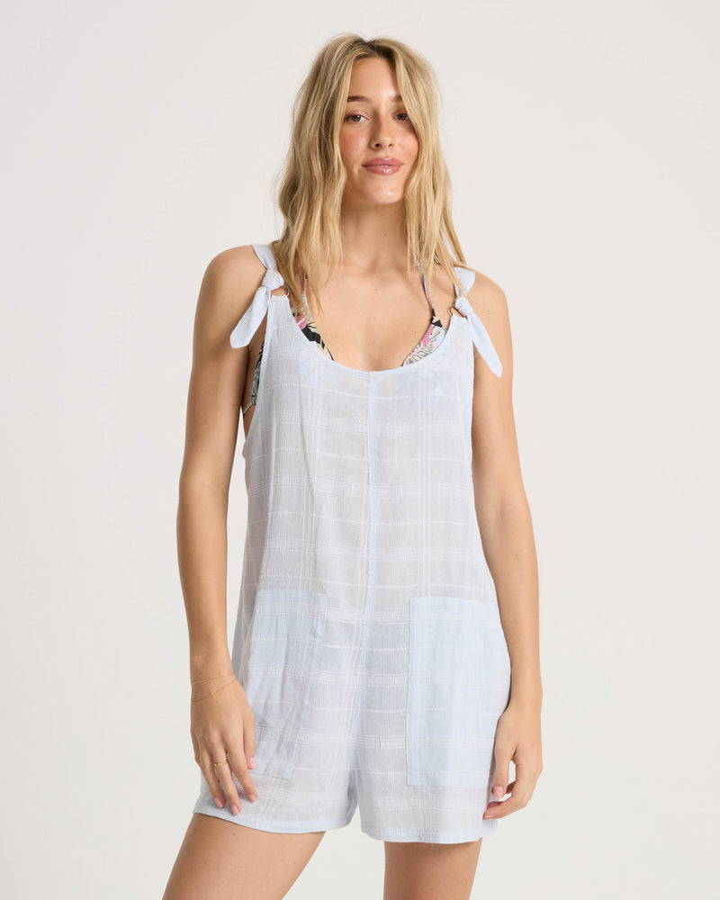 A pale blue cotton-viscose Women’s Lived In Short Romper Dobby utility romper featuring shoulder ties and two front patch pockets.