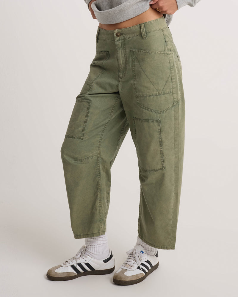 Volcom Women’s Patchwork Pants in an olive green, cropped, straight-leg fit, finished with large front pockets for a utility-cool silhouette.
