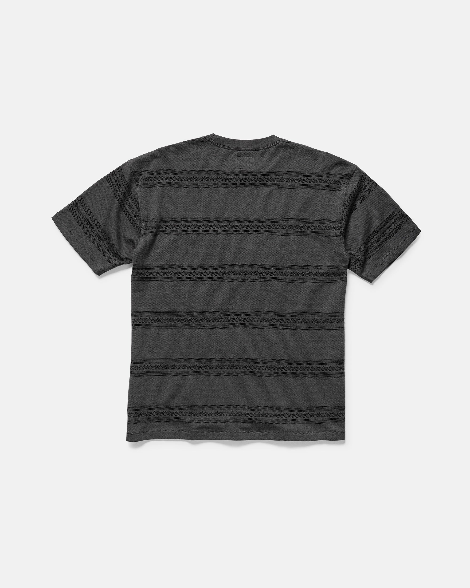 The Volcom Men's Yewster Crew is a short-sleeved black jacquard stripe jersey t-shirt with a crew neck and subtle dark gray stripes, shown flat with the back side up. Made from 100% cotton for comfort.