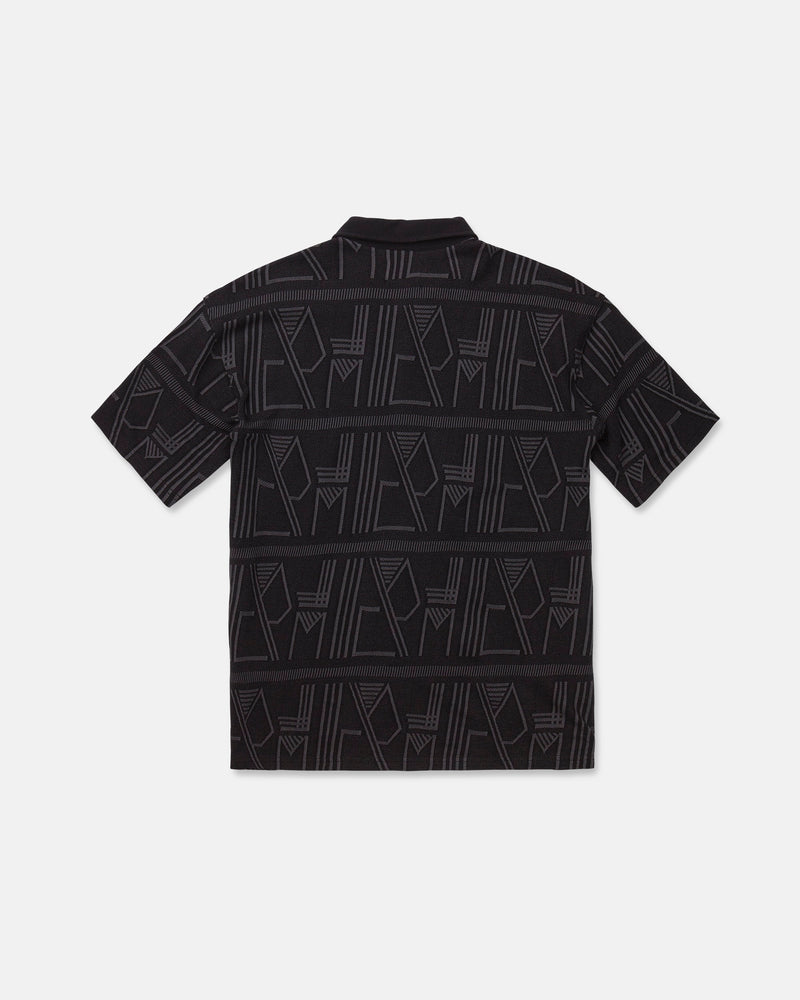 The Men's Stone Optix Polo by Volcom is a black short-sleeve shirt with an abstract geometric pattern in gray, featuring yarn-dyed jacquard lines and shapes across the fabric. Displayed flat to show the back side against a white background, this polo features a boxy fit.