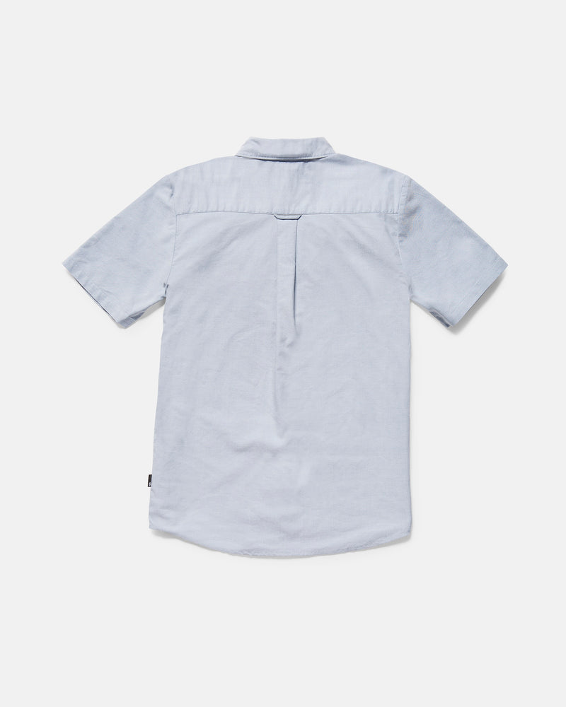 Volcom Men's Everett Oxford II Shirt in light blue shown from the back, features a single pleat, straight yoke, and classic fit. Lightweight fabric makes it ideal for casual wear.