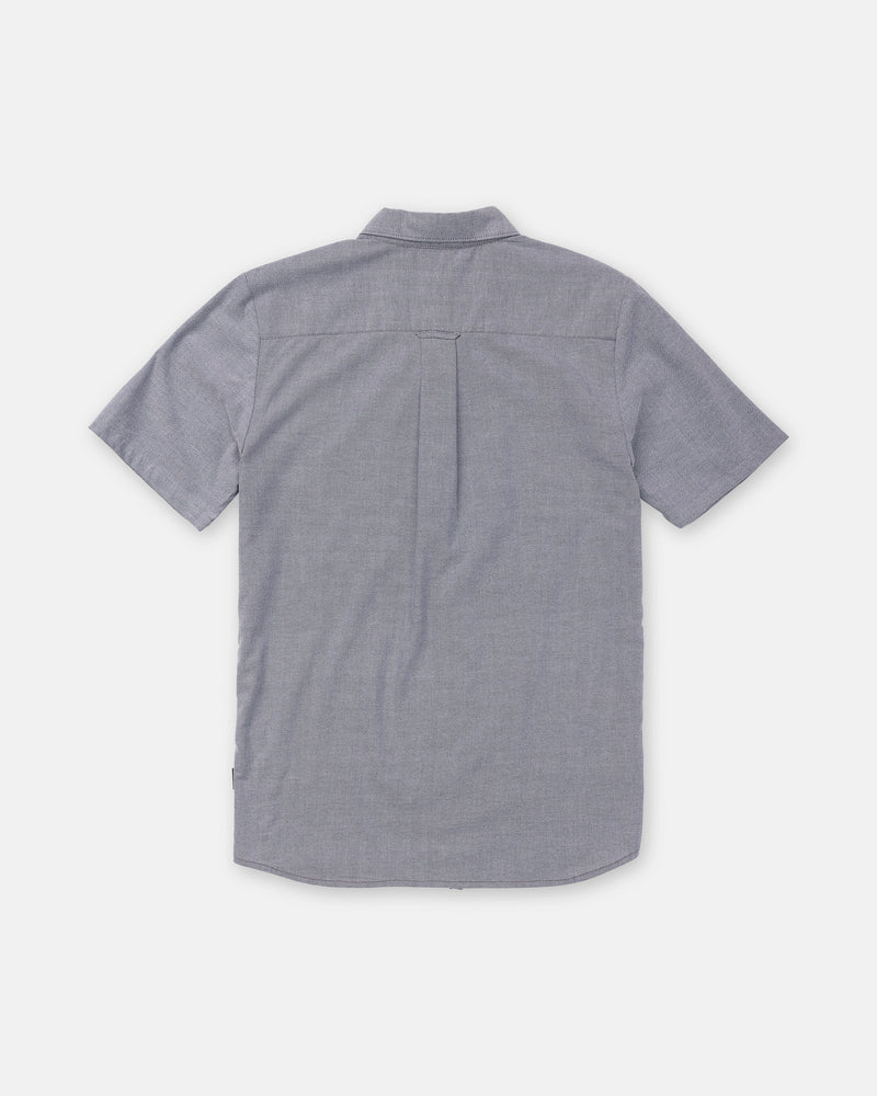 Back view of a gray, short-sleeved Men’s Everett Oxford II button-down shirt by Volcom featuring a box pleat.