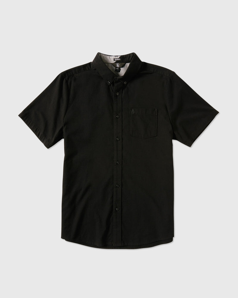 The Volcom Men's Everett Oxford Short Sleeve is a black, slim-fit shirt with a collar and single chest pocket, displayed flat on a white background.