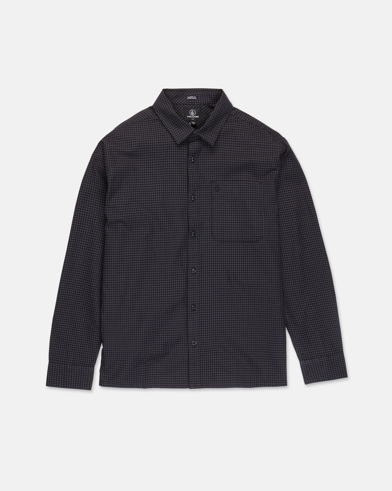 The Volcom Men's Glasnow Long Sleeve Shirt is a button-up, boxy fit style featuring a small black and dark blue checkered pattern, collar, and chest pocket. Crafted from yarn-dyed dobby texture fabric, it is shown laid flat against a white background.