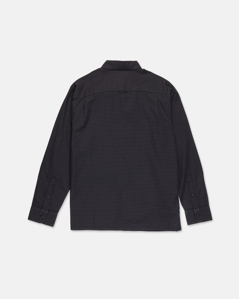 The Volcom Men's Glasnow Long Sleeve Shirt features a dark, small checkered pattern and subtle yarn-dyed dobby texture, displayed from the back on a plain white background.