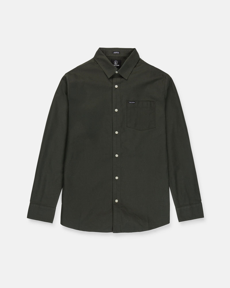 The Men's Veeco Oxford Long Sleeve Shirt by Volcom, shown in Climbing Ivy green, features a classic fit with a collar and single chest pocket, crafted from soft micro suede and displayed on a white background.