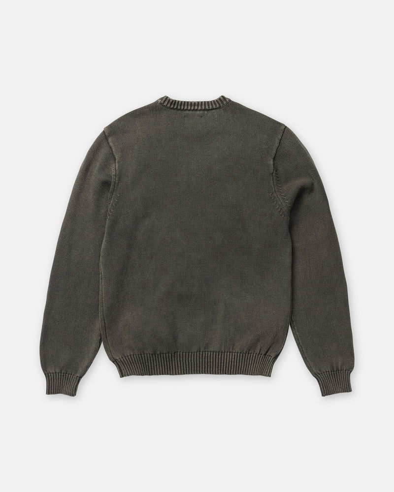 Back view of a Volcom Men’s Bleached Crew Sweater in a 100% cotton, dark, faded bleach wash with ribbed cuffs and hem.