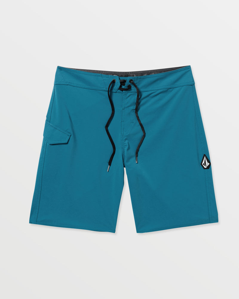 Men's Lido Solid Mod Trunks in teal blue, crafted from recycled polyester with a black drawstring waist, side pocket, and small logo patch on the lower left leg, shown on a white background.