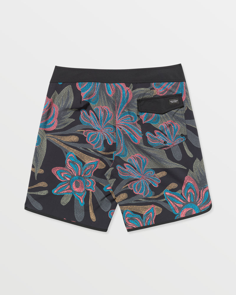 The Men's Infuse Scallop Mod Trunks are black Volcom surf trunks with a vibrant floral print in pink, blue, and beige, featuring a single back pocket and black waistband—ideal for quick-drying swimwear.