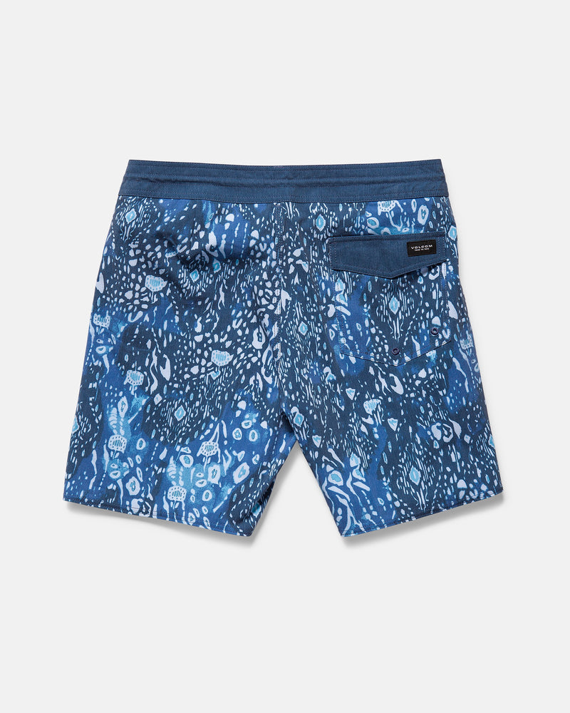 The Volcom Men's Psyche Cotton 17" Trunk features a white and dark blue abstract print, elastic waistband, Stoney Cinch Fly Technology, and a single back flap pocket, shown on a plain white background.