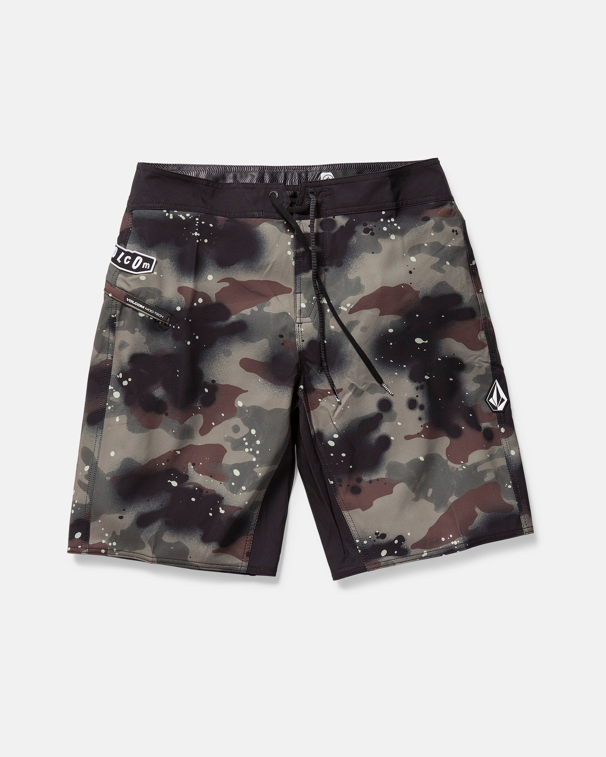 The Volcom Men's Fomenter Mod boardshorts in camouflage print feature 4-way stretch Stone Shield fabric, a black waistband and side panels, front drawstring, and two logo patches on the left leg and near the waist pocket.