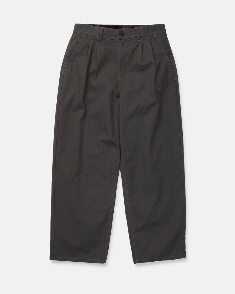 The Volcom Men's Baggos Pleat Pants are wide-leg, high-waisted charcoal gray pants made from cotton chino fabric, featuring pleats, side pockets, and a button and zipper closure, shown flat on a white background.