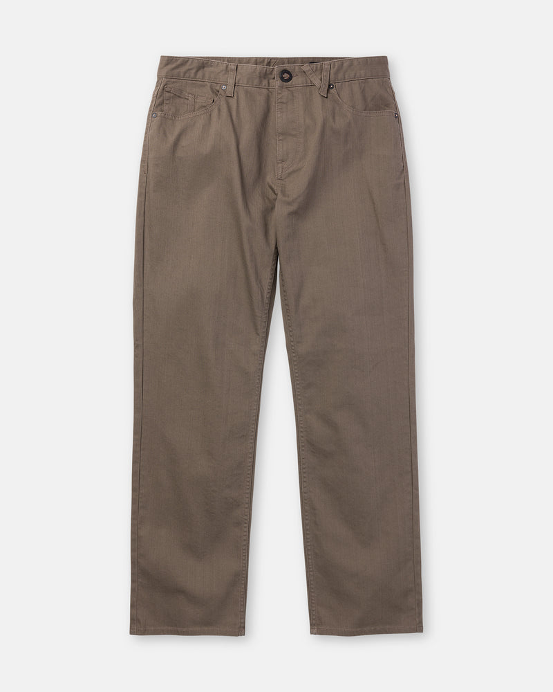 A pair of Volcom Men’s Kinkade Slub Pant in brown, featuring straight legs, button and zip closure, front and back pockets, laid flat on a white background.