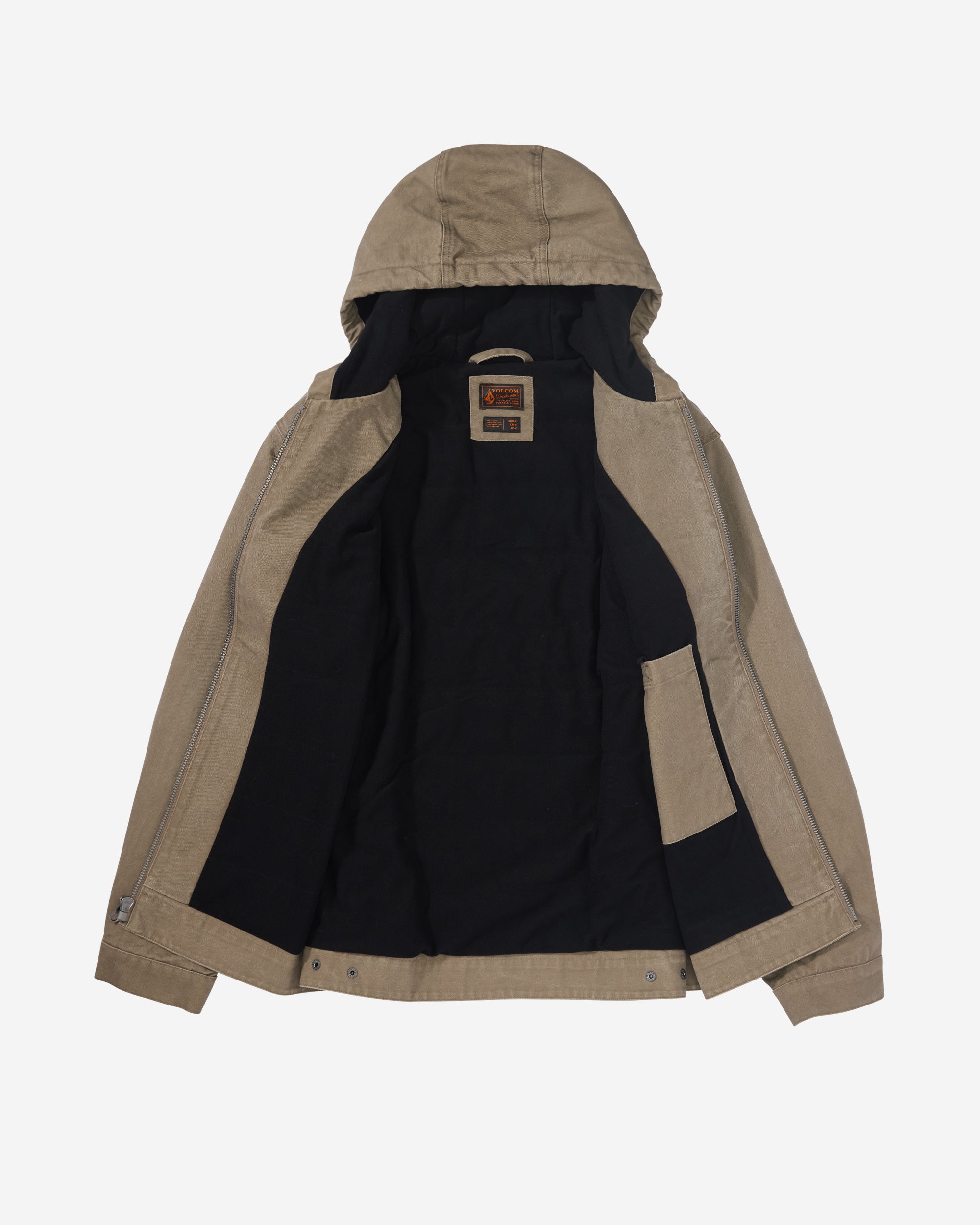 The Volcom Men's Freshdust Workwear Jacket is tan with a hood, large hand and chest pockets, an inner left pocket, dark lining, a zip front with metal snap buttons, and a Volcom Workwear label near the collar.