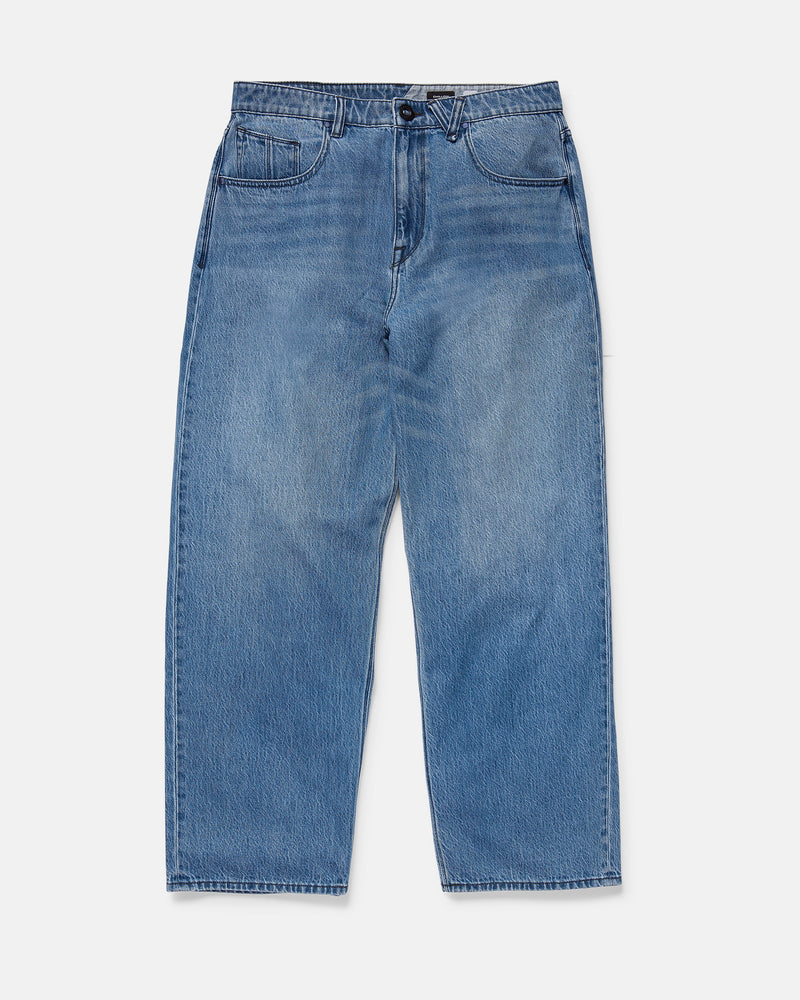 A pair of Volcom Men's Chillow Denim Vs jeans in light blue, featuring a high-waisted, relaxed straight-leg fit, five classic pockets, and button-zip closure, laid flat on a white background.