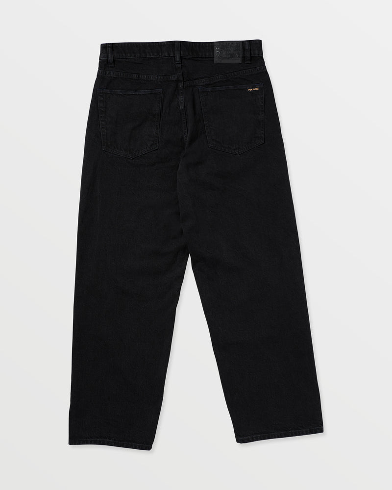 A pair of Volcom Men's Billow Denim jeans in black twill, featuring two large back pockets and a black waistband patch, displayed flat on a white background.