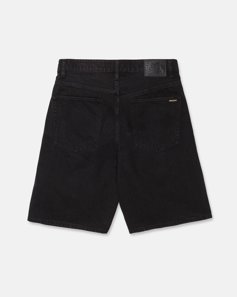 The Men's Billow Denim Shorts by Volcom are displayed from the back, highlighting two large back pockets and a black patch on the waistband. Featuring a relaxed silhouette inspired by baggy denim shorts, they also showcase a small gold SOLLACK label above the right pocket.