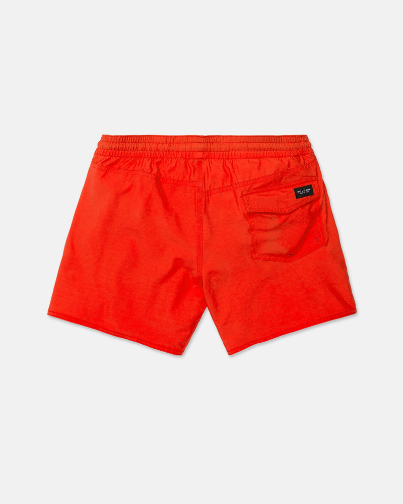 The Volcom Men's Lido Solid Trunks in bright red are displayed from the back, highlighting an elastic waistband and a single back pocket adorned with a small black label. Made from recycled polyester and featuring a 16-inch outseam, these swim trunks are laid flat on a white background.