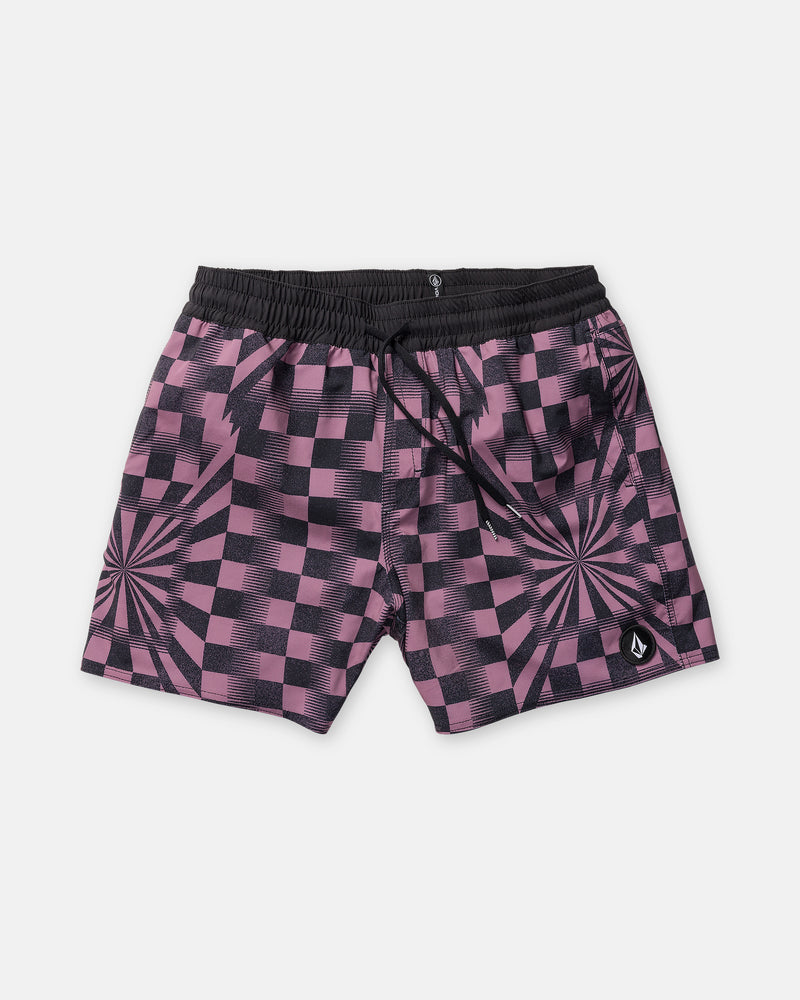 The Volcom Men’s Lido Print Trunk 16 swim shorts feature a purple and black checkered design with optical illusion spiral patterns on each leg. Designed for comfort and mobility, these trunks are crafted from 4-way stretch fabric and include an elastic waistband with a drawstring Cinch Fly. A small Volcom logo patch accents the left leg near the hem.