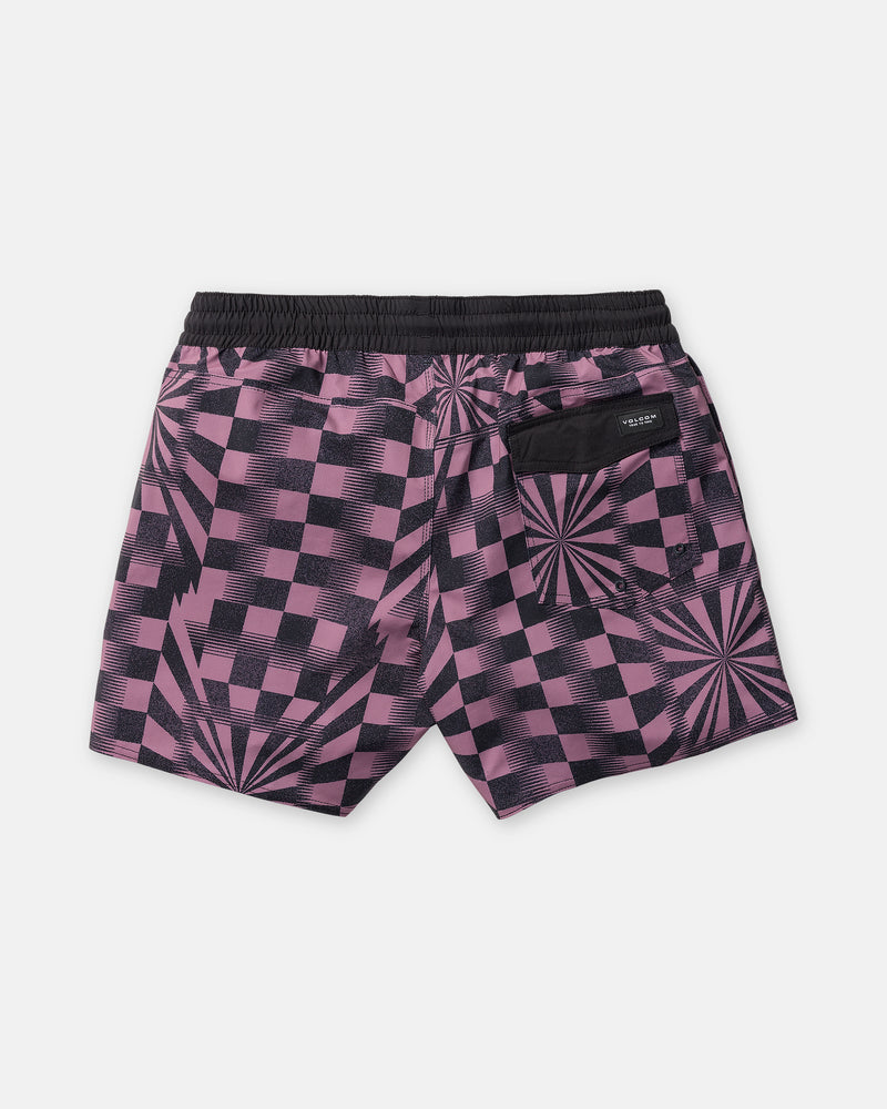 The Men’s Lido Print Trunk 16 by Volcom showcases a purple and black checkered design with starburst patterns, an elastic waistband, and a black back pocket. These trunks are crafted from comfortable 4-way stretch fabric and are displayed flat with the back side facing up.