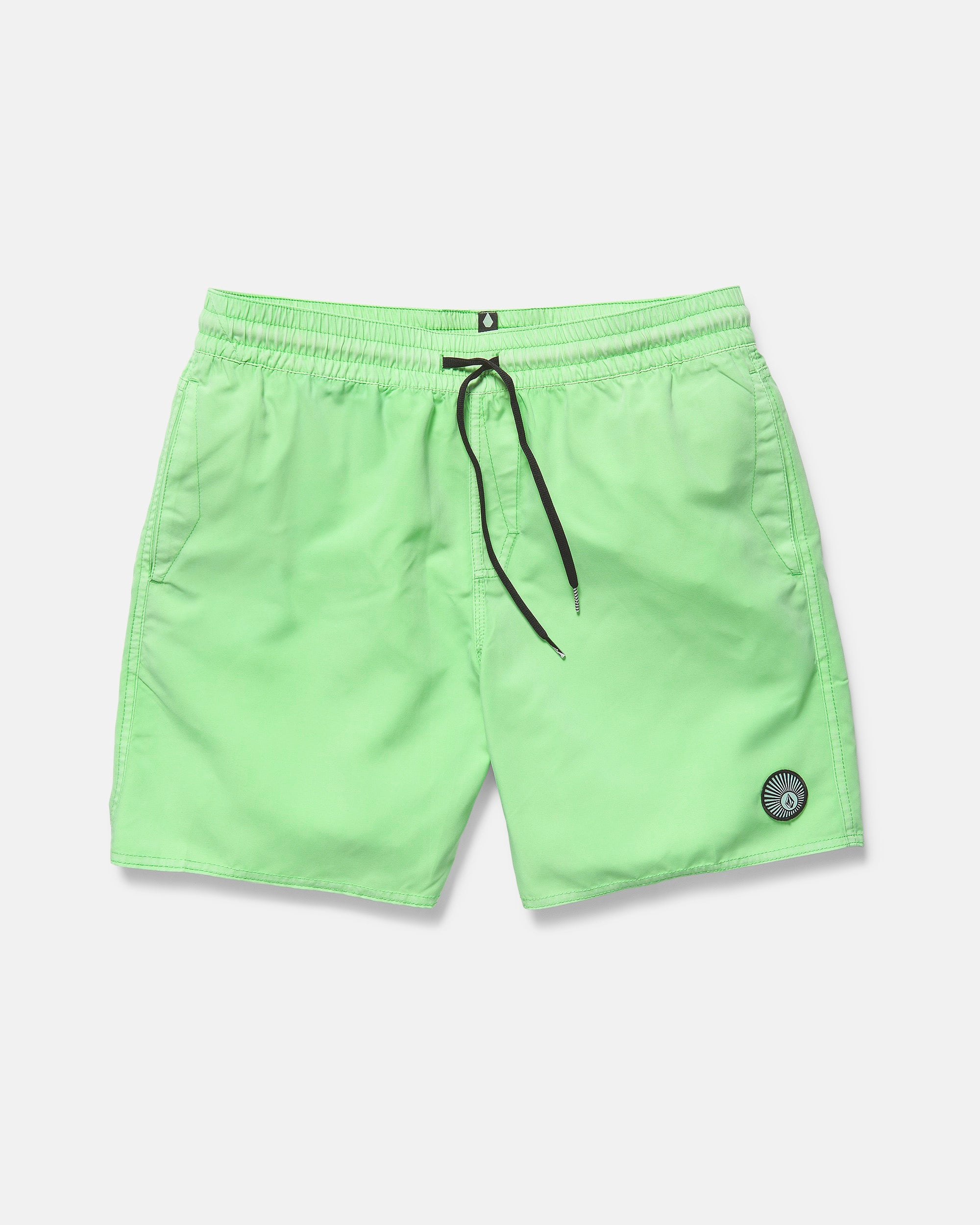The Volcom Men's Center Elastic Waist 17" Trunk in neon green is made from recycled polyester, with an elastic waistband, black drawstring, side pockets, and a circular patch logo on the left leg, shown on a plain white background.