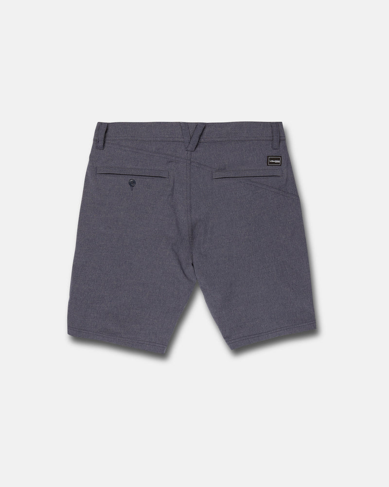 Back view of Volcom Men's Frickin Cross Shred Static Shorts in heathered charcoal with belt loops, two back pockets—one buttoned—and a small black label above the right pocket, shown on a plain light gray background.