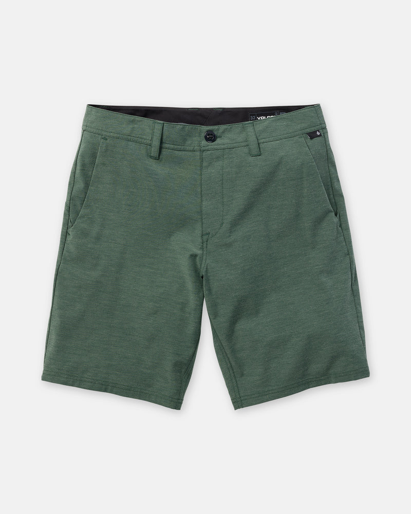 The Men’s Frickin Cross Shred Static 20 shorts by Volcom feature a green, knee-length modern fit with side pockets, belt loops, and a button closure. Crafted from recycled polyester, they are shown laid flat on a white background.