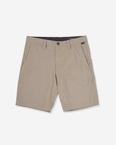 The Volcom Men's Frickin Cross Shred Shorts in light khaki feature water-repellent fabric, button and zipper closure, side pockets, belt loops, and a 20" outseam, shown laid flat on a white background.
