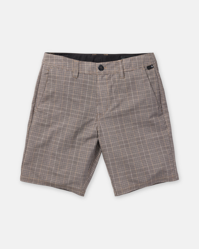 A pair of Volcom Men’s Mix Frickin Cross Shred 20 shorts in a Desert Palm plaid pattern with shades of brown and beige, featuring front pockets, belt loops, a front button, and zipper closure. These modern-fit shorts are laid flat on a white background.