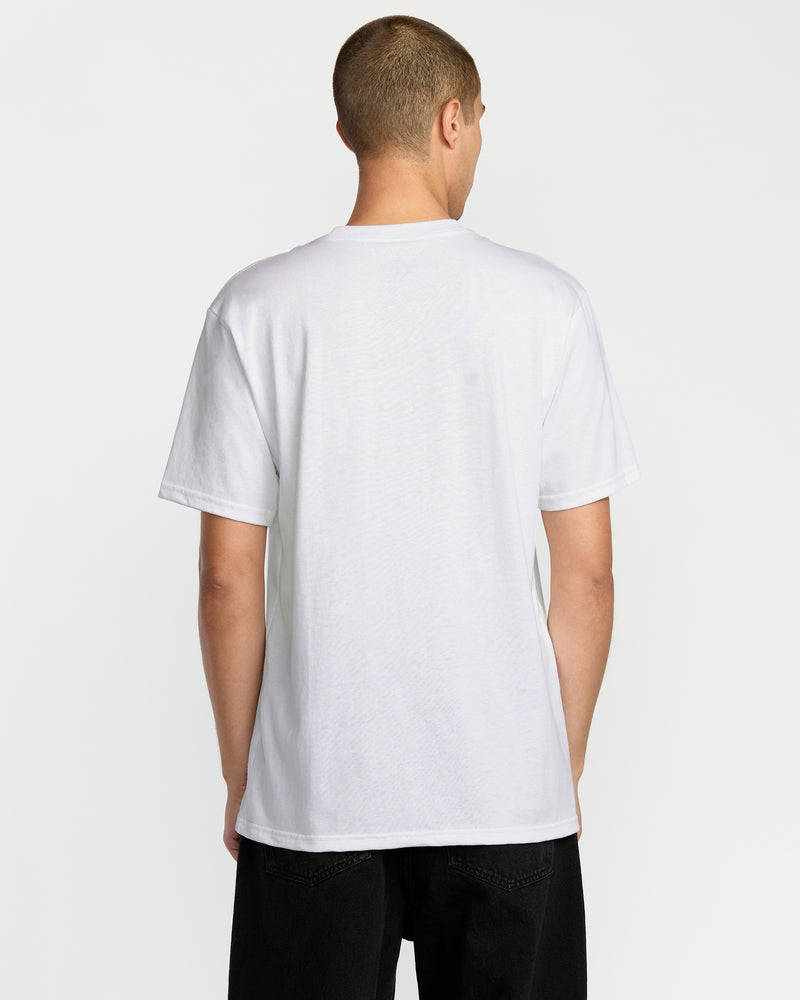 A person with short hair is facing away from the camera, wearing a Volcom Men's Pass Line Short Sleeve Tee in white and black pants, set against a white background.