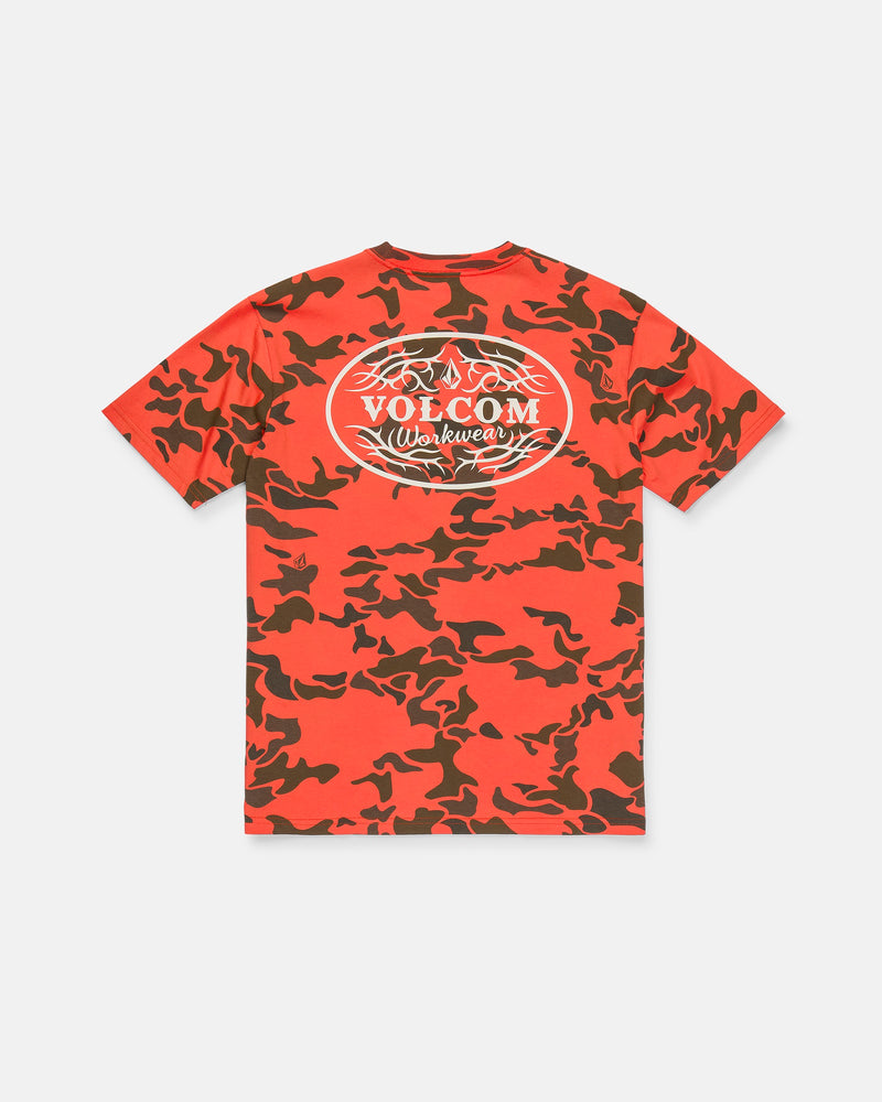 The Men’s Safety Workwear Short Sleeve Tee by Volcom is a red and dark brown camo t-shirt featuring a white oval Volcom Workwear logo and barbed wire graphic on the back. This premium cotton tee is displayed laid flat on a white background.