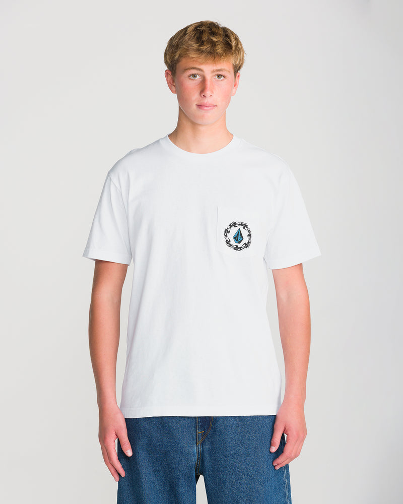 A man wearing a white Volcom Men’s Twister Short Sleeve Tee, featuring a circular black and blue graphic on the chest pocket.