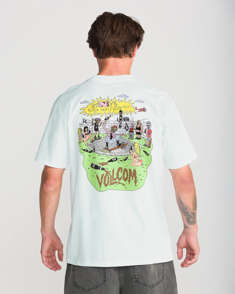 A person wears the Men’s Zombeach Short Sleeve Tee by Volcom, a classic-fit heavyweight cotton shirt with a colorful cartoon back graphic of people, sun, clouds, SOL PARTY SOLD OUT text, and the Volcom logo.