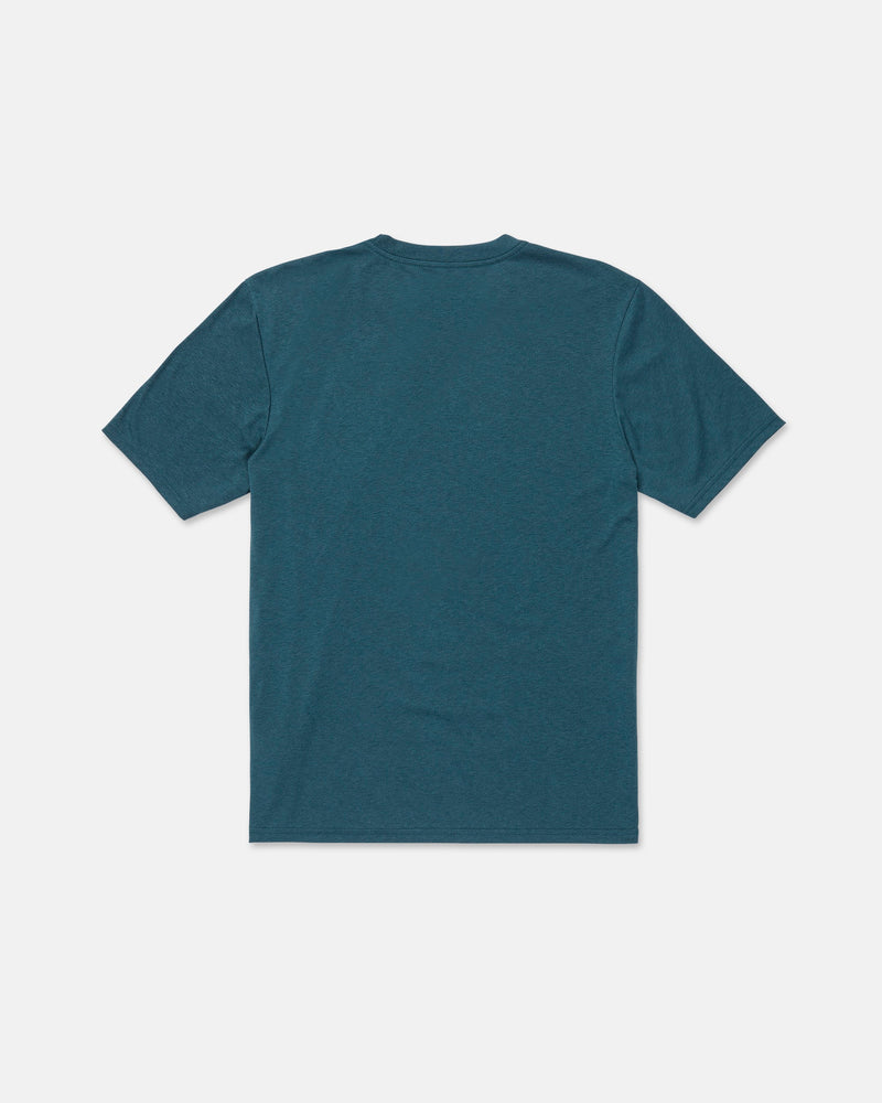 A Volcom Men's Stone Tech Short Sleeve Tee in teal, featuring a modern fit and plain, short sleeves, is laid flat with the back side facing up against a white background.