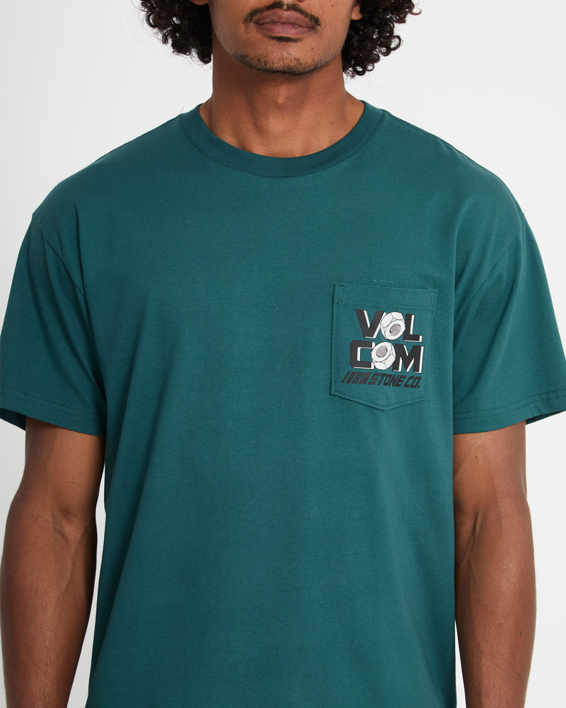 A person wears the Volcom Men's Parted Out Pocket Short Sleeve Tee in teal, featuring a chest pocket with black, white, and gray graphics and the Volcom logo. Shown from shoulders to waist against a white background.
