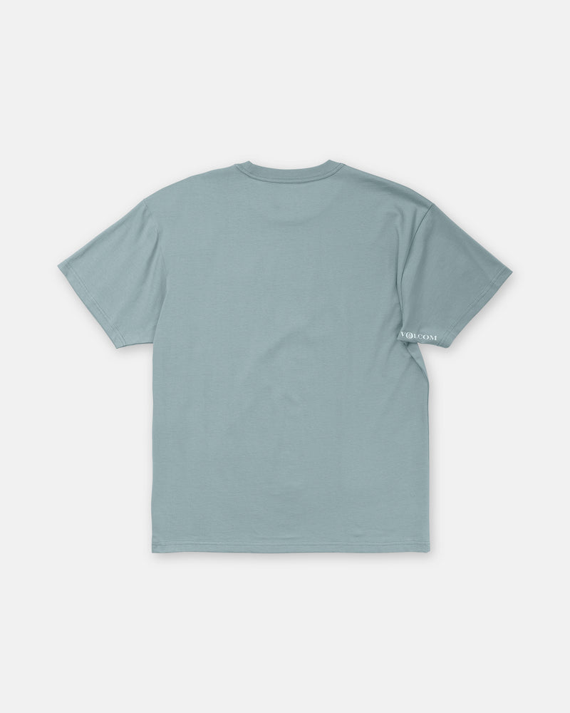 Back view of a muted blue-grey Volcom Men’s Tooms Short Sleeve Tee in a heavyweight cotton loose fit, featuring a small white logo printed on the edge of the left sleeve.
