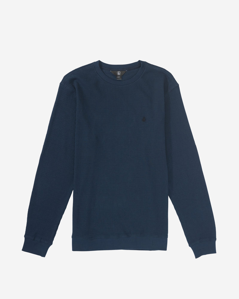 The Volcom Men's Gridstone Crew Long Sleeve in navy blue features a subtle textured pattern and is shown laid flat on a white background.