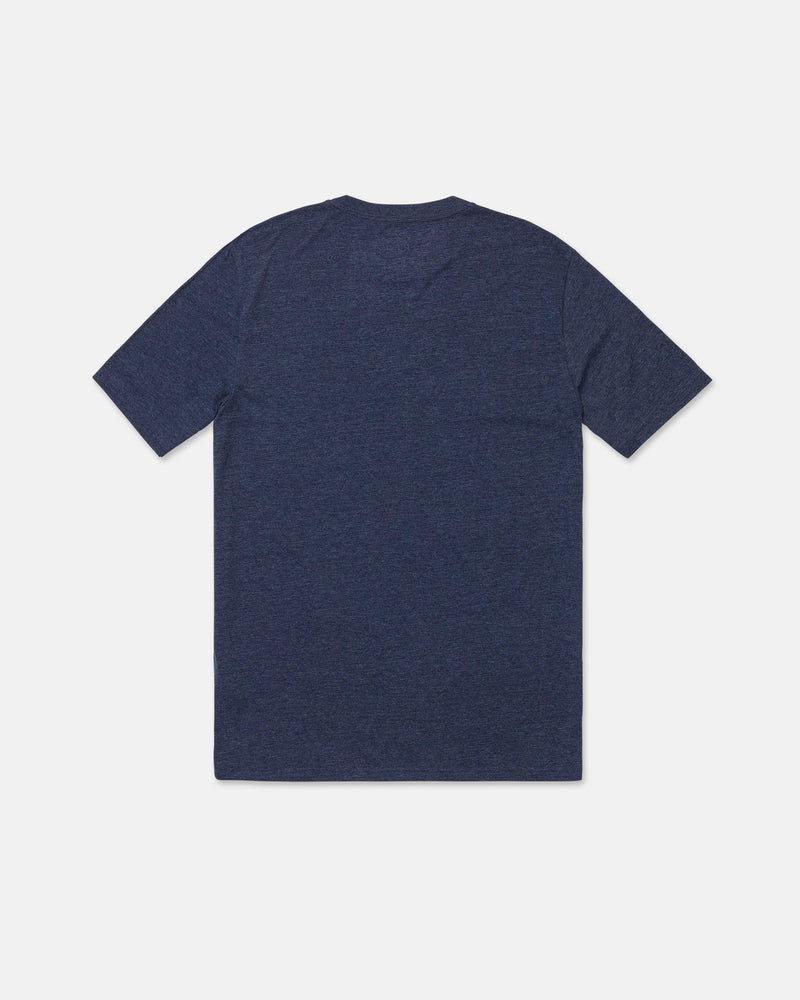 A Volcom Men's Line Feld Short Sleeve Tee in dark blue, featuring a modern fit and plain design, is laid flat on a white background with the back side visible.