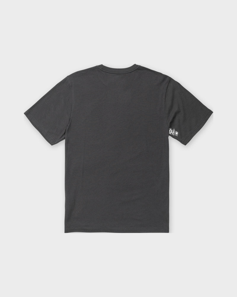 A plain Washed Black Heather Men’s Core Stone Short Sleeve Tee by Volcom is displayed flat, back side up. A small white Dime logo appears near the right sleeve hem. The background is light gray.