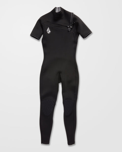 The Volcom Men's 2/2MM Short Sleeve Full Wetsuit in black features a zippered shoulder, reinforced knee pads, and a white logo on the left chest, shown against a plain light background.