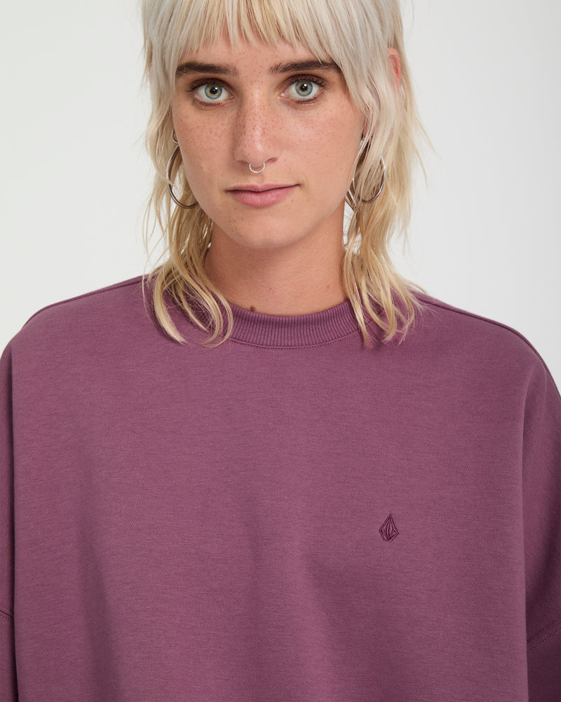 A deep plum Volcom Sto N Crew oversized crewneck sweatshirt with a small embroidered logo on the chest.