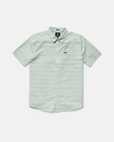The Men's Bankstone II Short Sleeve Tee by Volcom features a light green color, classic fit, crew neck, and single chest pocket. This textured tee is laid flat on a white background.