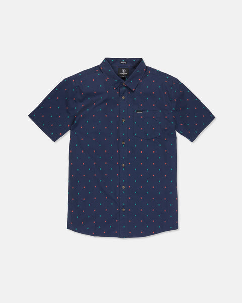 The Boy's Bankstone Short Sleeve Shirt by Volcom is a navy blue button-up with a collar and chest pocket. Featuring a boxy fit, this shirt is designed with an allover print of small, colorful polka dots.