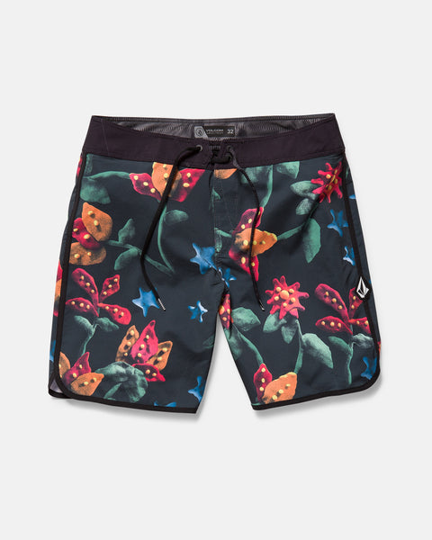 The Volcom Kids' Big Boys' Infuse Scallop Mod features black boardshorts with a tropical floral print, Cinch Fly Technology, a black drawstring waistband, and a small Volcom logo patch on the right leg.