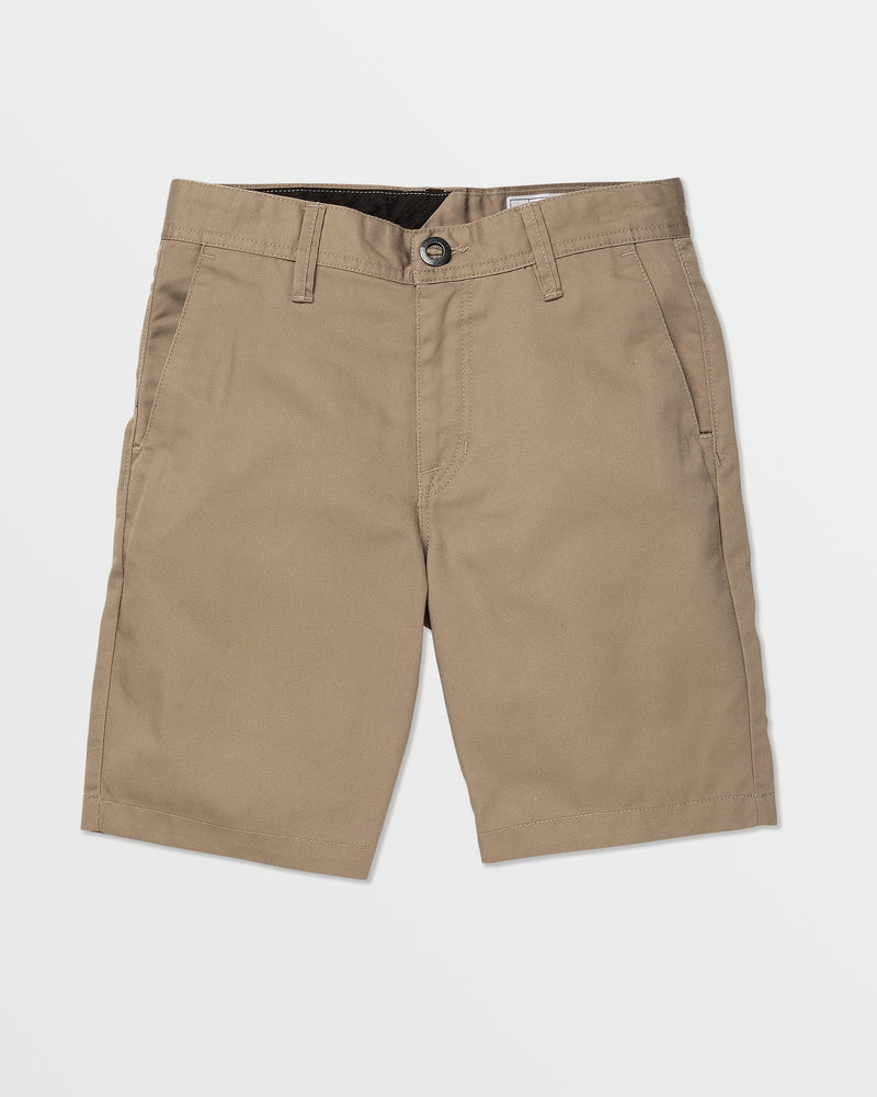 A pair of Kids' Frickin Chino Shorts 16" by Volcom in khaki, featuring a modern fit, front pockets, belt loops, and a button closure, laid flat on a white background.
