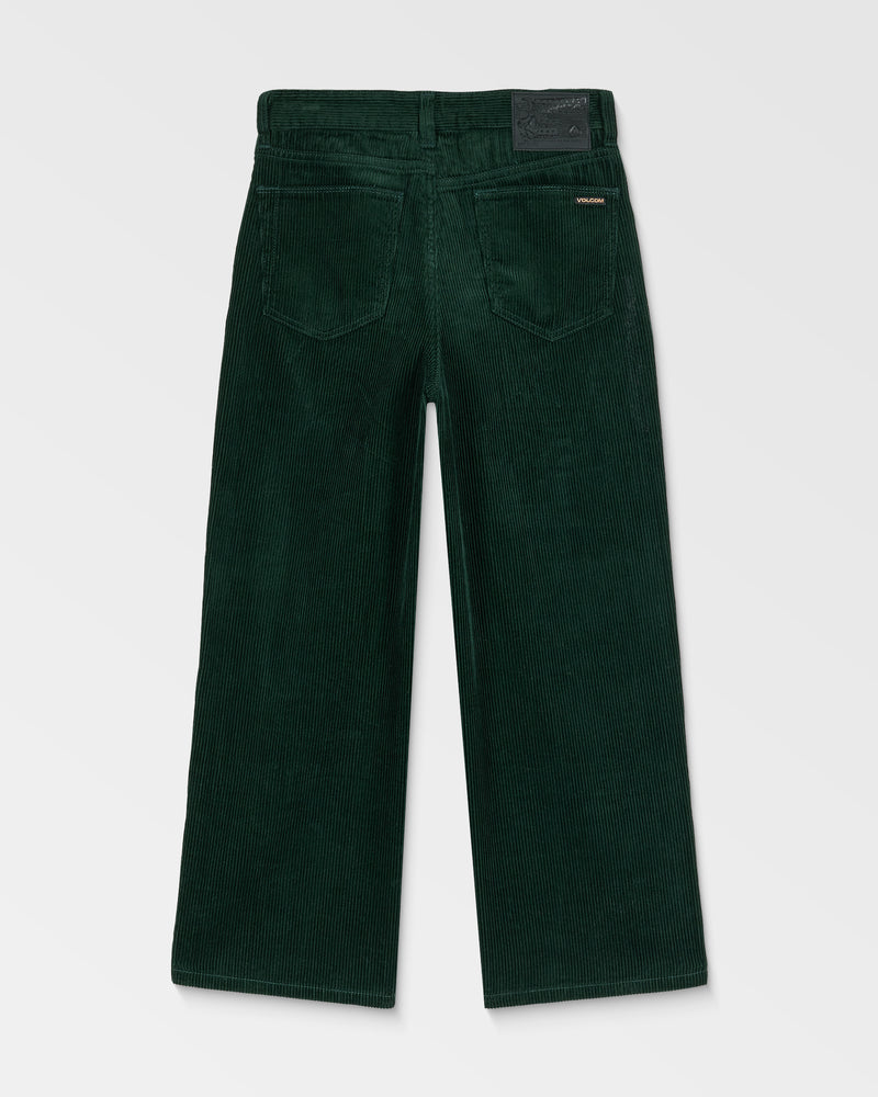 Kids' Big Boys' Billow Cord Pants by Volcom in dark green, shown laid flat from the back with a loose tapered fit, wide legs, two back pockets, and a black brand label on the waistband against a plain light gray background.